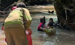 Derede akıntıya kapılan çocuğu itfaiye ekibi kurtardı