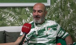 Bursaspor'un fanatik taraftarı takma dişinin damağına da kulüp amblemi yaptırdı
