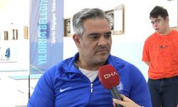 Eski engelli milli atlet, gündüz sporcu yetiştirip, akşam pamuk şeker satıyor