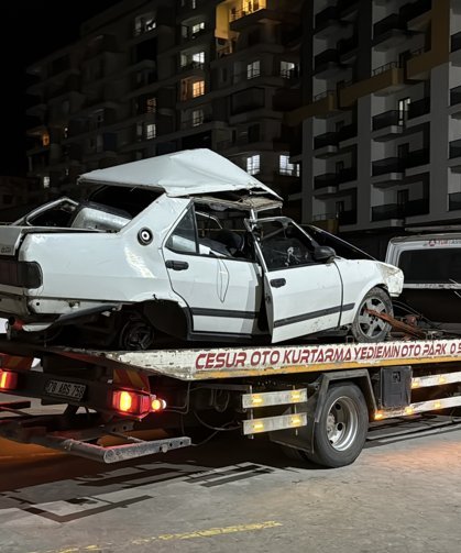 Apartmanın bahçesine düşen otomobilden atlayarak kurtuldular